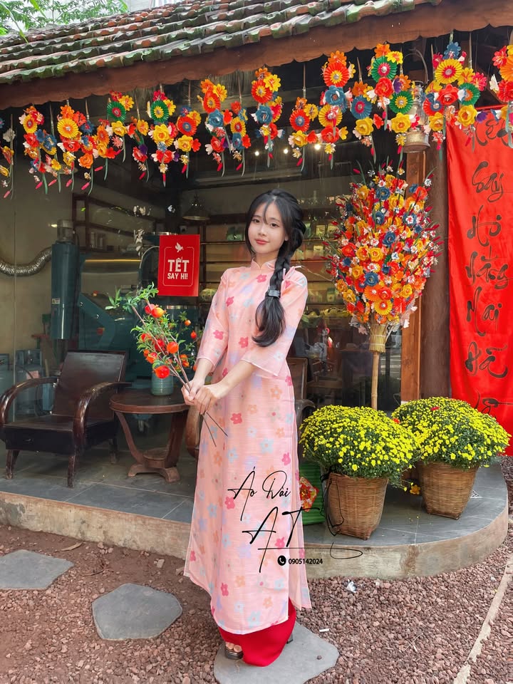 ao-dai-cach-tan-mau-hong-cam -ADAT-2025